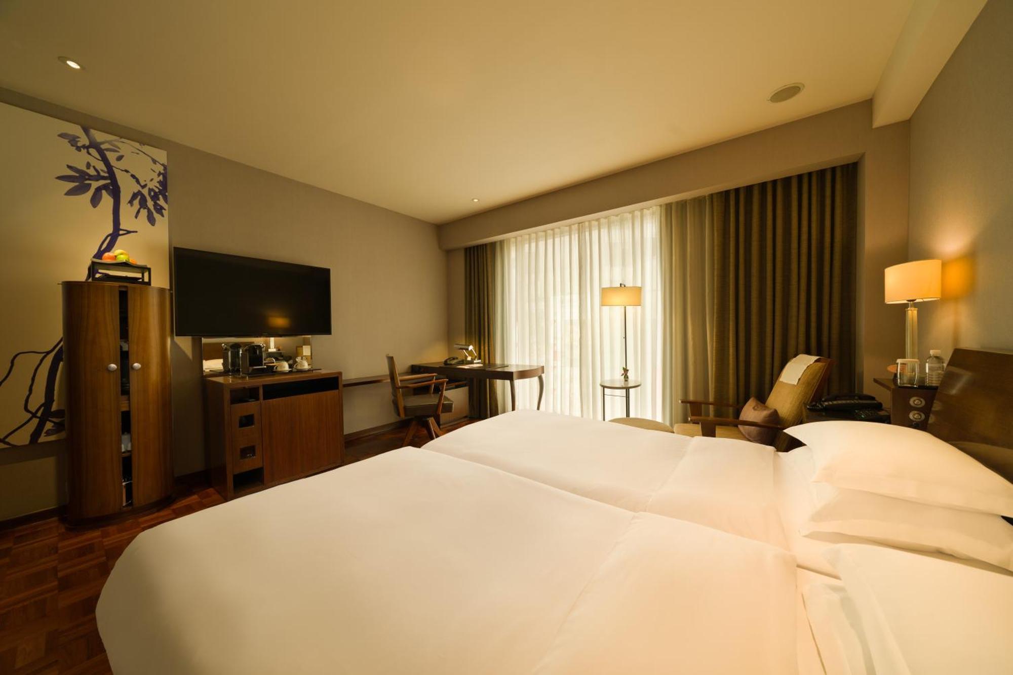 Les Suites Taipei Ching Cheng Habitación foto